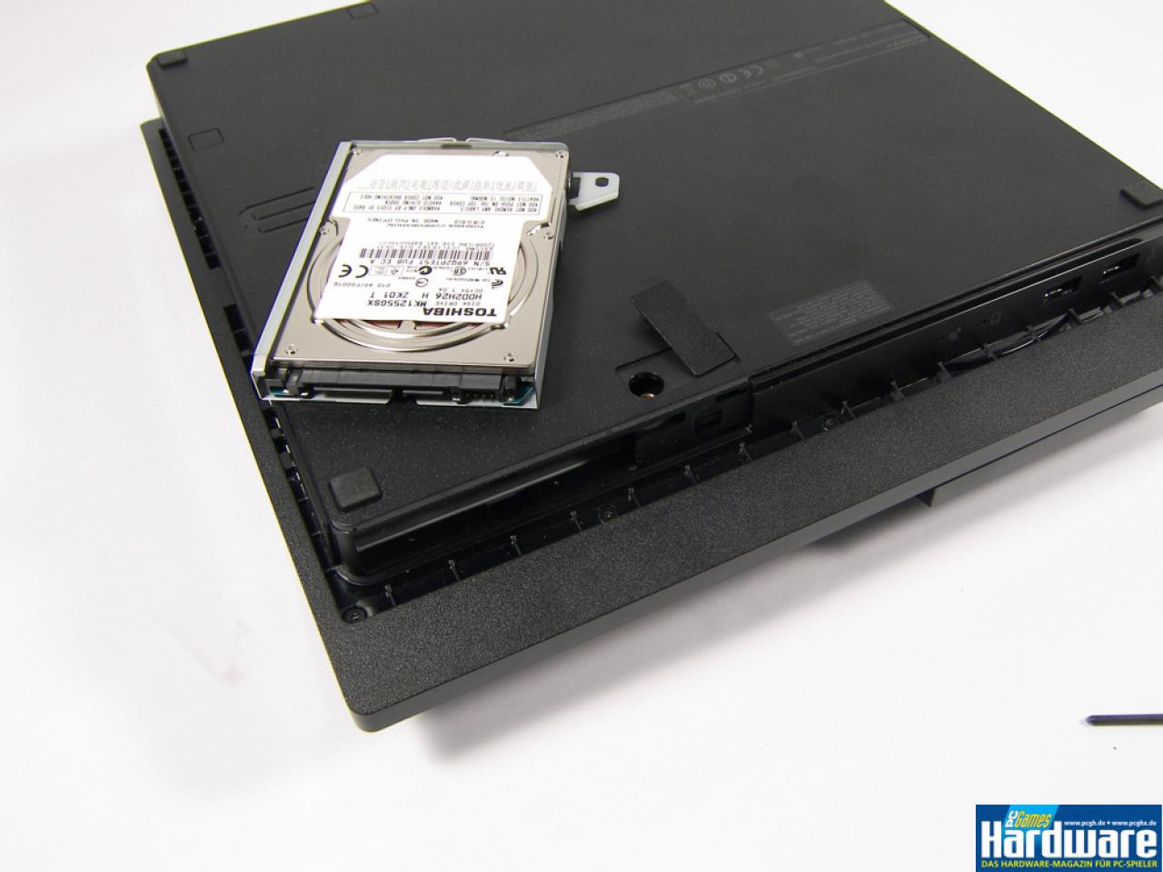 [09/09/2009] 4. Schritt HDD austauschen: Neue Festplatte in Halterung einbauen
