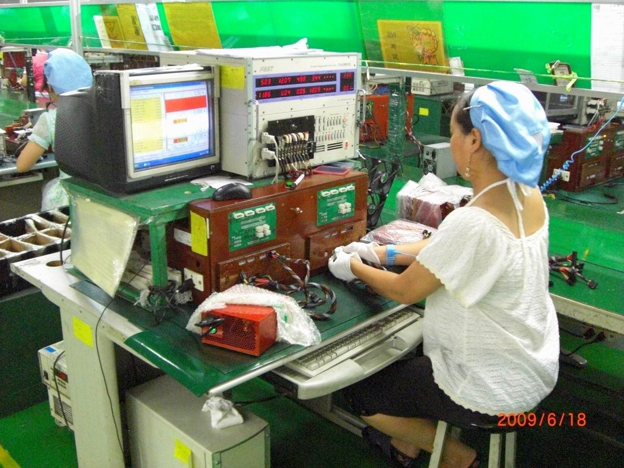 [23/12/2009] Weitere Bilder aus der Netzteilfertigung bei Cougar (10)