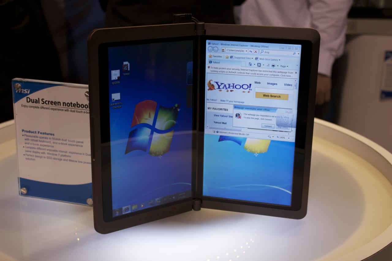 [08/01/2010] Dieses Netbook besitzt zwei 10-Zoll-Touchscreen-Monitore und läuft unter Windows 7. Eine virtuelle Tastatur auf dem 
