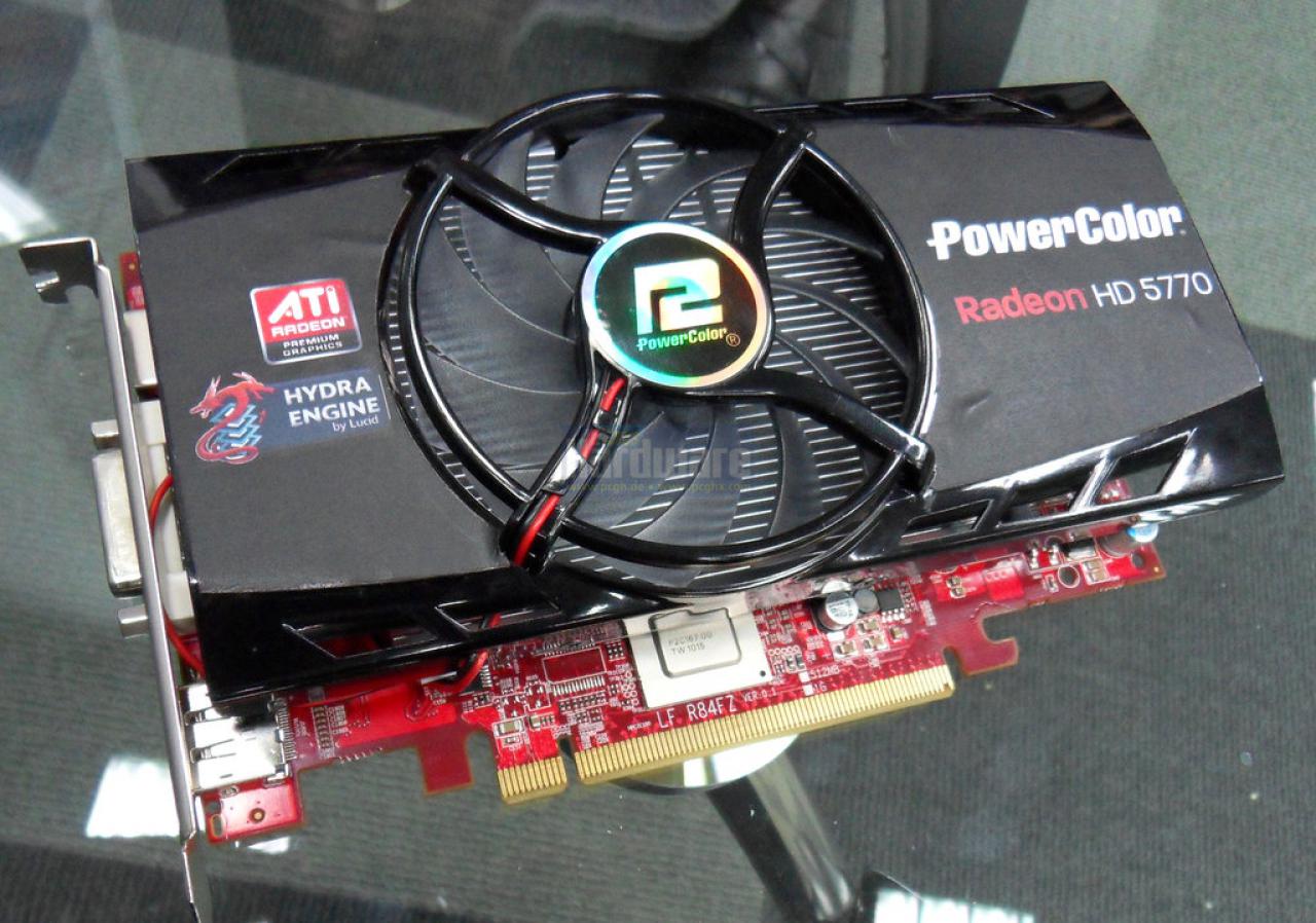 [25/06/2010] Auf der Computex zeigte Powercolor uns zwei besonders kuriose Radeon-HD-5770-Modelle. Beide verfügen über separate Chips, die nicht direkt etwas mit Grafik zu tun haben. Diese HD 5770 Evolution hat Lucids Hydra-Chip an Bord und kann so zusätzlich zu einer (fast) beliebigen Zweitkarte betrieben werden...