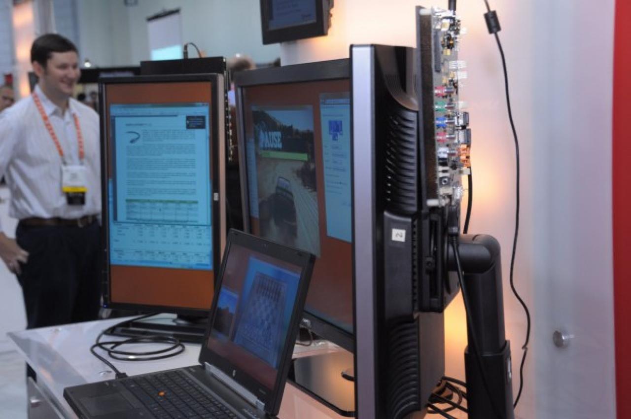 [17/01/2012] CES 2012: Daisy-Chaining erlaubt theoretisch bis zu 63 Monitore an nur einer Grafikkarte. (6)