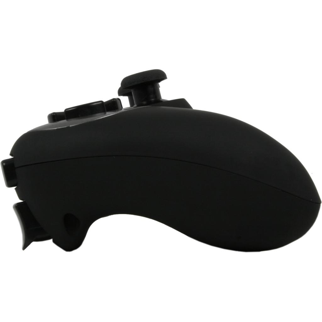 [25/03/2012] Das USB Wireless Gamepad lässt sich während des Spielens aufladen und hält drahtlos 30 Stunden durch. (5)