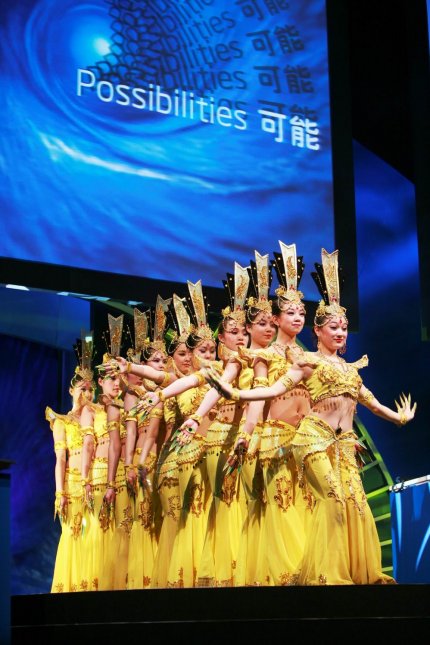 A Chinese dance troupe gives a literal show of hands to open the Intel Developer Forum keynotes on Day 1 of the technology showcase. The event runs April 17-18 in Beijing.