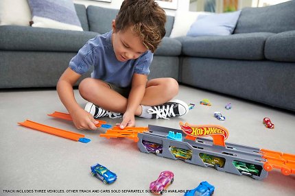 Hot Wheels 2 in 1 Transporter mit Rennbahn