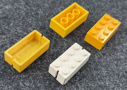 Der heutige Lego-Stein und das Original von Kiddicraft.