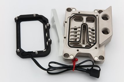 As good as it gets: the Delta Mate MPII is the world's only CPU water block with a borosilicate-glass viewing window. The flow-optimised machining beneath it is a sight to behold.