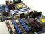 Asus Rampage II Gene, Sockel 1366 (hinten) und Asus Maximums II Gene, Sockel 775 (3)