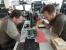 Carsten und Raff versuchten sich diese Woche an einer analogen Beschäftigung. Das nicht näher bekannte Spiel nutzt offensichtlich Bananen und Nvidia-Tassen als Figuren und zwei Voodoos als Spielbrett. Vielleicht wurden aber einfach nur zwei Grafikkarten verglichen.