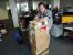21.12.2014: Raff hat seine kompletten Weihnachtsgeschenke verpackt [Anmerkung von Raff: Von wegen - das sind Testmuster, die zurück müssen :P] und wartet jetzt auf den Prakti, der ihm den Stapel zum Postversand transportiert. Der Grafik-Guru hätte wahrscheinlich auch noch bis zum Sankt Nimmerleinstag gewartet, wenn ihm nicht eingefallen wäre, dass wir ja schon seit Monaten keine Praktikanten mehr hatten. Und wenn Sie denken er würde deshalb seine Zunge so komisch herausstrecken, liegen Sie falsch. Raff ist neben Tom der größte Goat-Simulatior-Fan auf Erden und ahmt deshalb auch gern mal eine Ziege nach - zumindest mit der Zunge. Baaah! :)