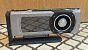 Tommi1: "Meine EVGA GTX 780 mit GTX980 Ti Backplate auf Ständer m Regal"