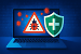 <strong>Symbolbild zum Antivirusprogramm-Test 2025: </strong>Laptop mit Virenwarnung und Schutzschild für digitalen Virenschutz unter Windows 11&nbsp;