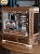 Richu006: "The Swiss Harmonic Engine​"<br>Die Grundidee war, meine zwei Welten zu kombinieren:<br><br>- PC-Modding<br>- Instrumentenbau (Schwyzerörgeli)<br><br>Ziel war es, ein möglichst stimmiges Gesamtbild zu schaffen, das sich thematisch irgendwo an ein "Schwyzerörgeli" (Ziehharmonika schweizer Spezialität) anlehnt.<br><br>Deshalb fiel die Wahl auf:<br><br>- Nussbaum als Hauptmaterial<br>- Ahorn für Einlagen (klassische Intarsien)<br>- Gold-/Messing-Akzente für den passenden Look<br><br>Und ja… ein Custom Loop musste natürlich auch integriert werden (Die gesponserte AIO musste dafür allerdings ziemlich Federn lassen… ursprünglich war sie mal eine AIO) (2)