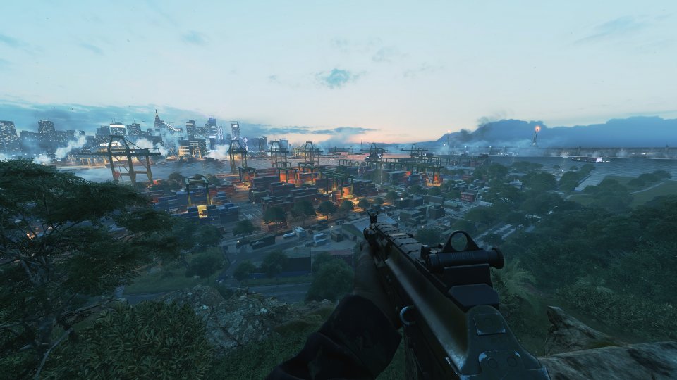 Battlefield 2042 – Die Karte Manifest (Frachtliste) ist eine der optisch interessanter gestalteten Maps. Dunkler Dschungel, ein vielfarbiges, schummig erhellte und von feingliedrigen Kränen überspanntes Labyrith aus Frachtkontainern sorgen für einen ansehnlichen Kontrast, der hell erstrahlende Hintergrund sorgt für Lebendigkeit.
